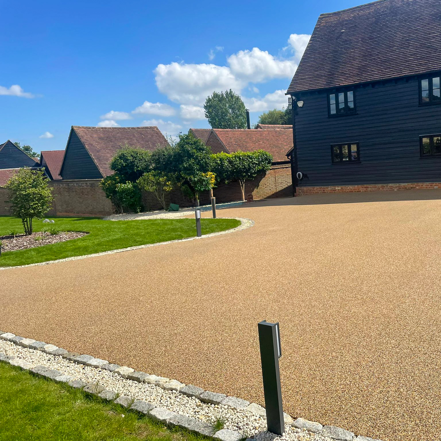 Domestic resin driveway in Terrabound Golden Tan, side angle.